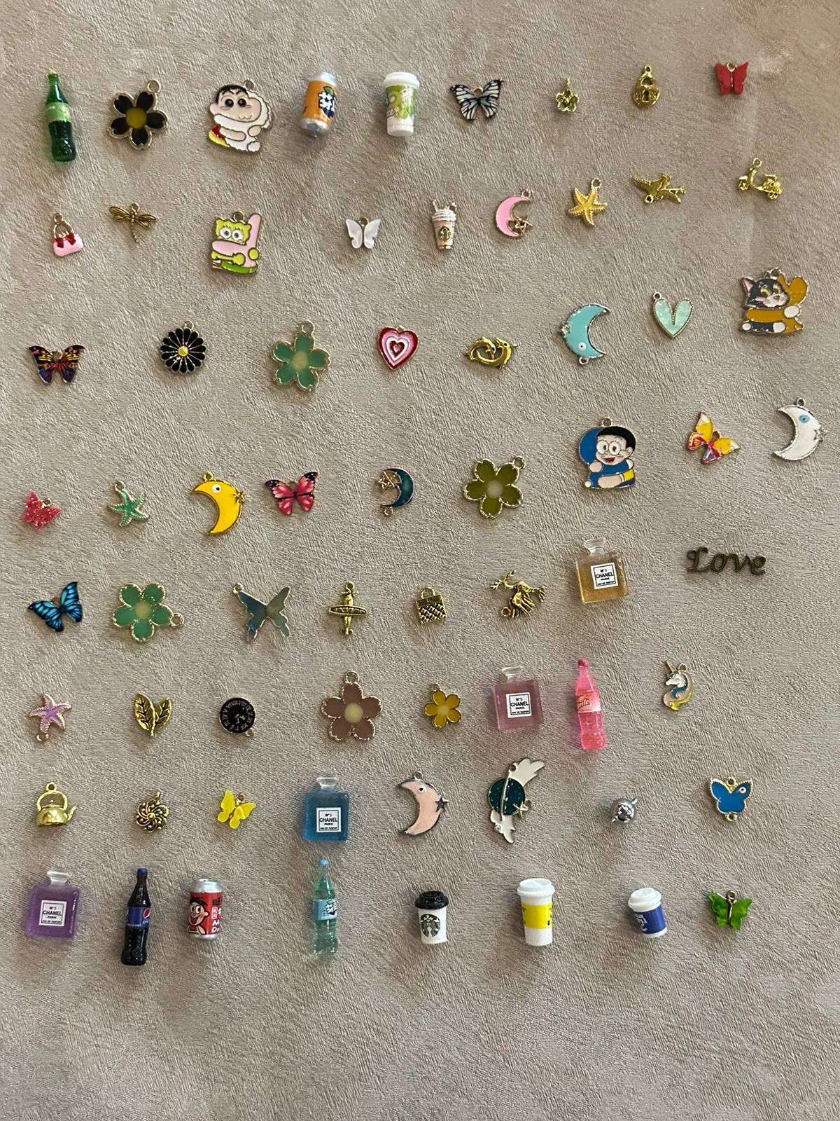 Charms under 9/-