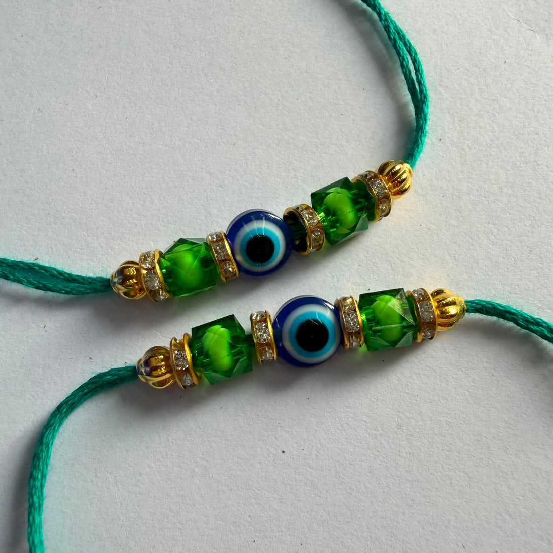Ready Rakhi thread evil eye green