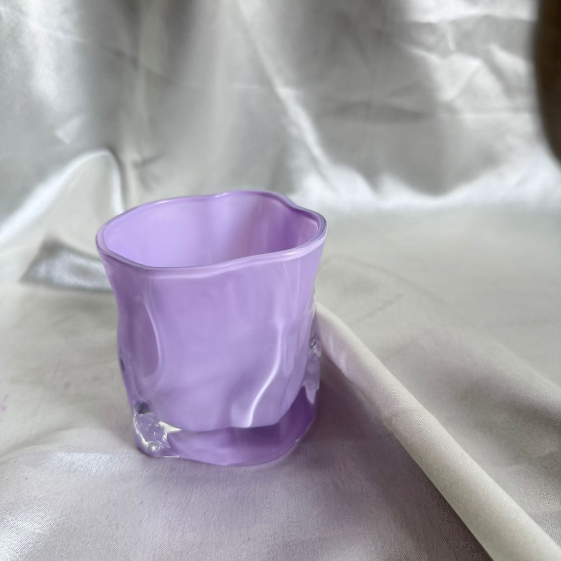 Uneven lilac candle glass