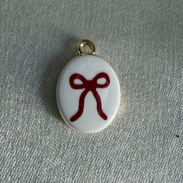 Bow white charm