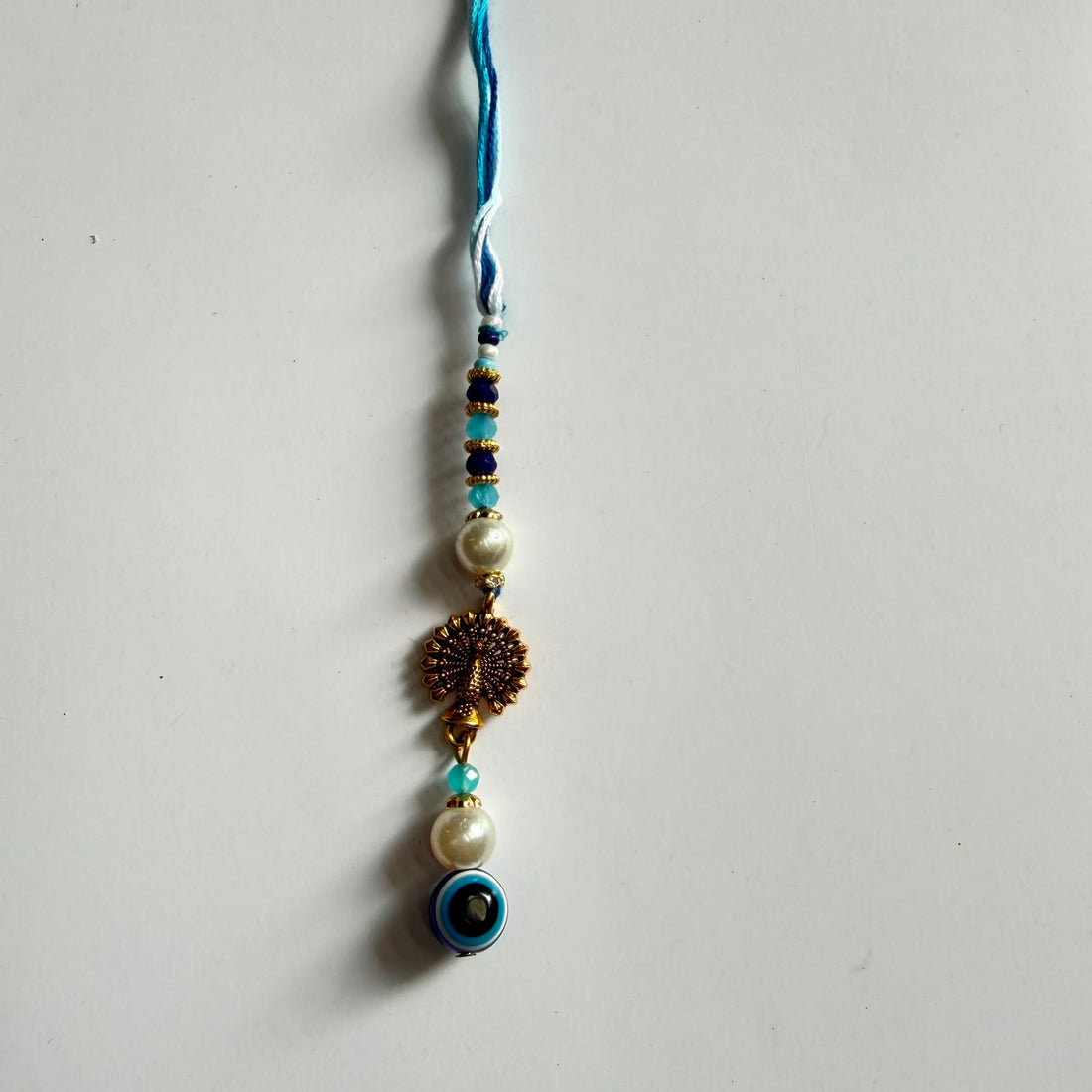 Rakhi evil eye lumba