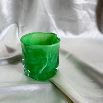 Uneven green candle glass