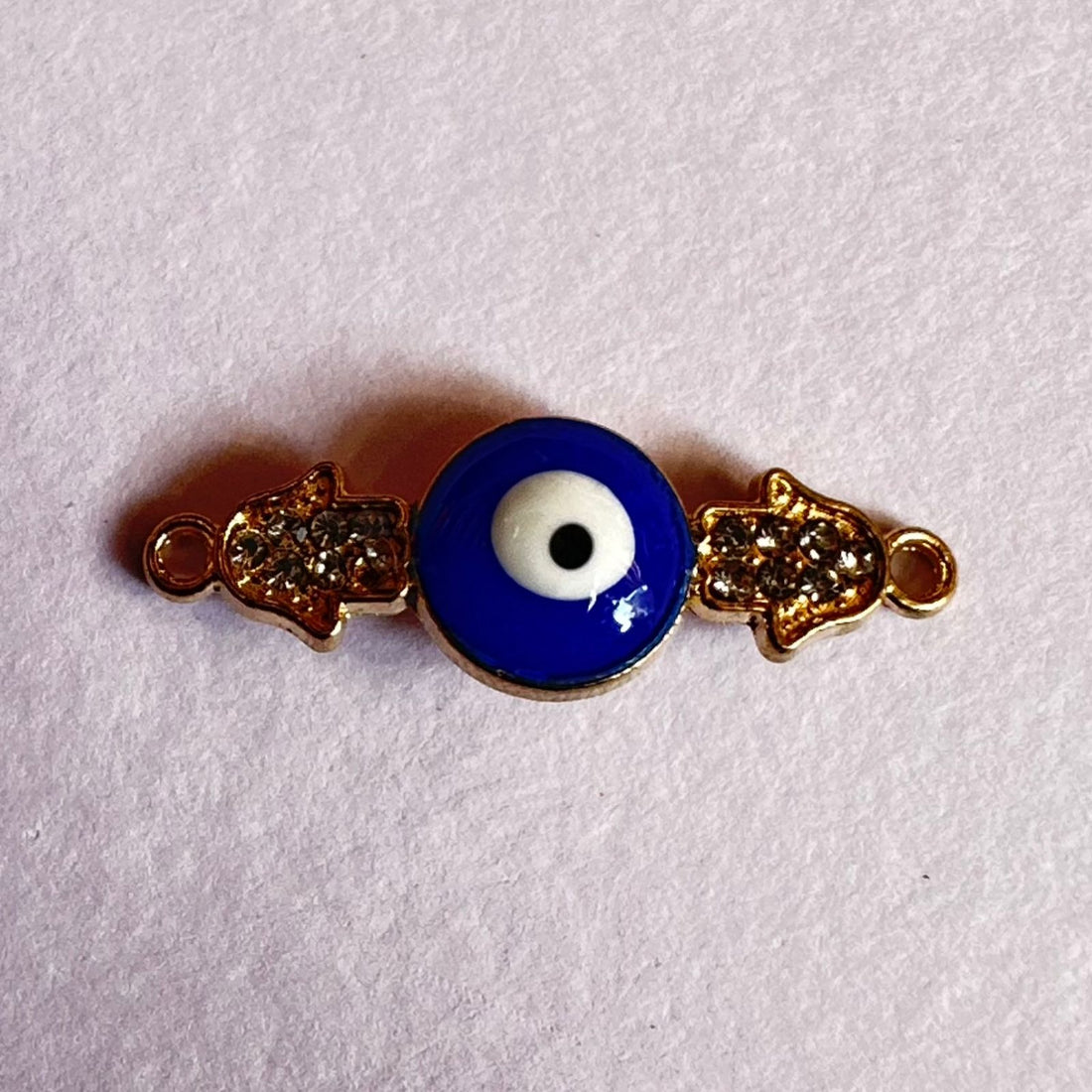 Rakhi evil eye charm 