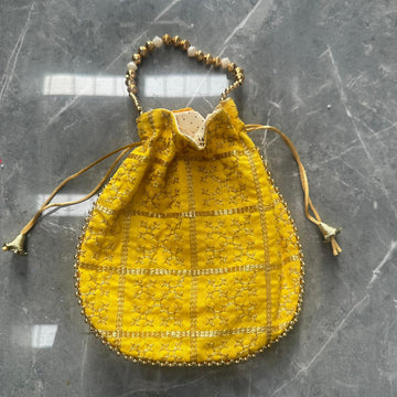 Yellow Potli bag