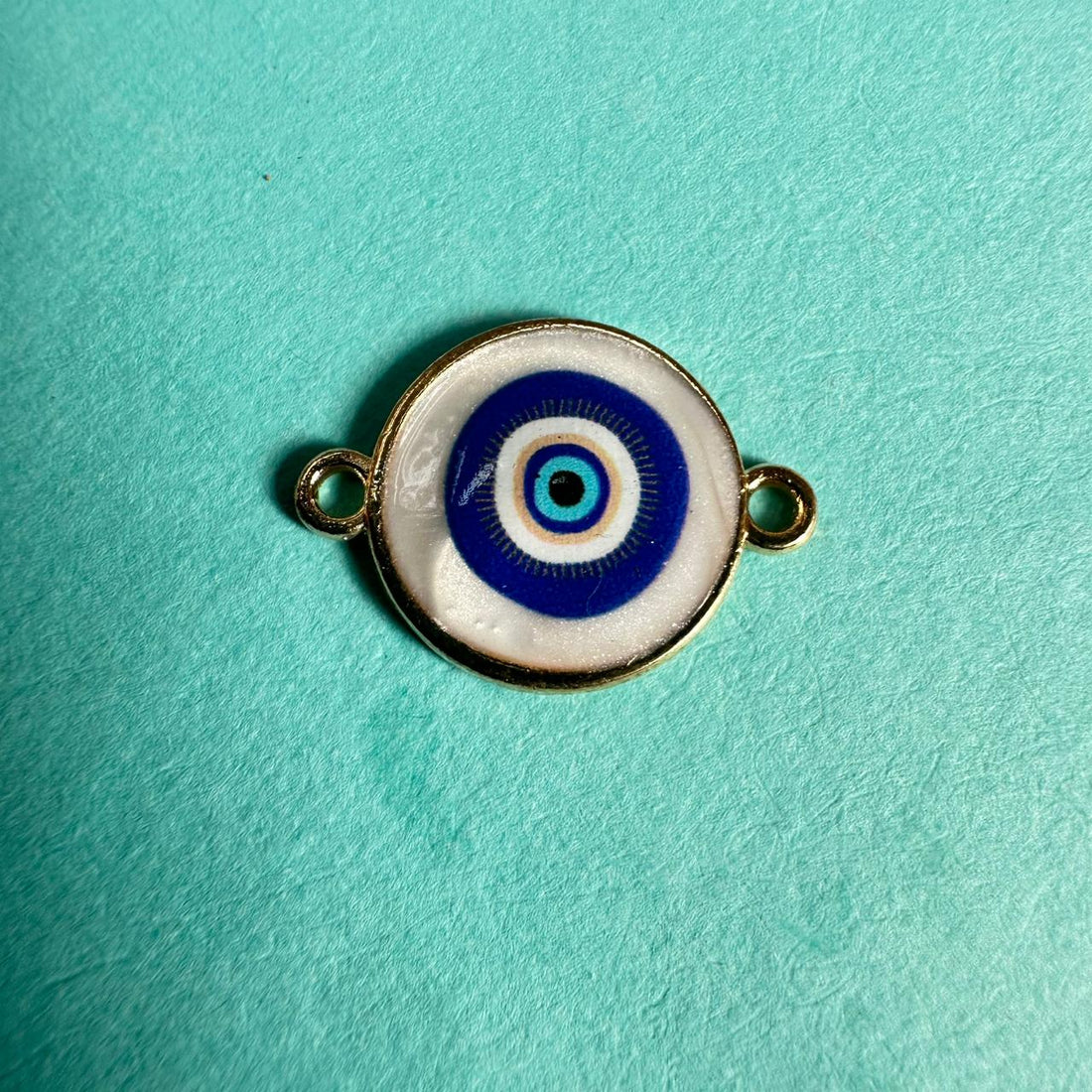 Rakhi evil eye charm