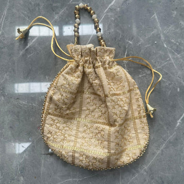 Cream Potli bag