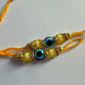 Ready Rakhi thread evil eye yellow