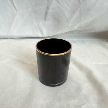 Black glass jar with gold border