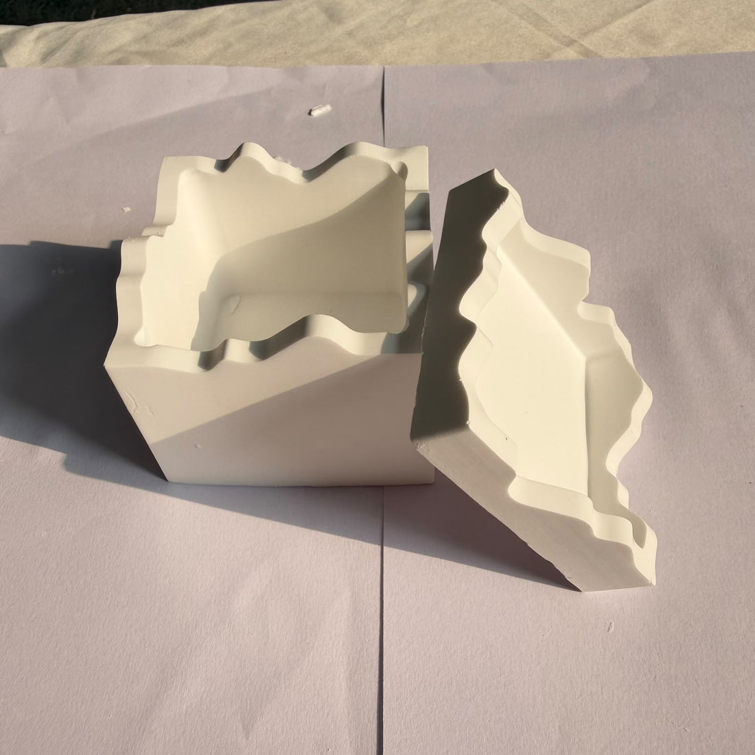 Uneven square concrete jar