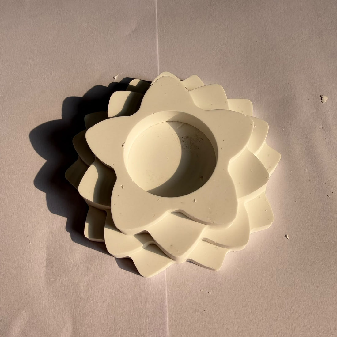 Layered star tealight concrete holder