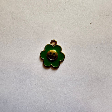 Green smiley flower charm