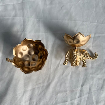 Elephant with diya urli