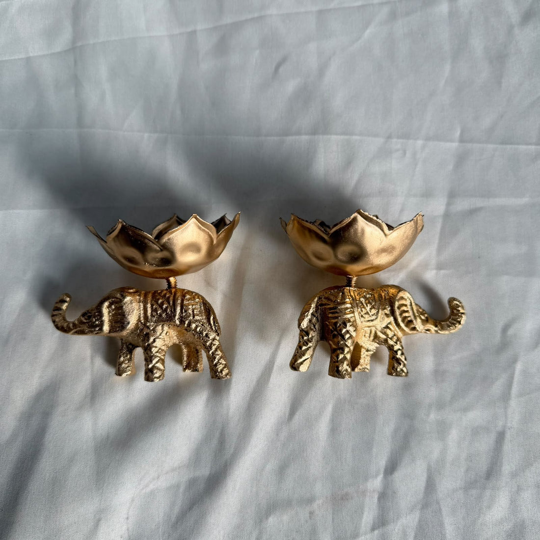 Elephant with diya urli