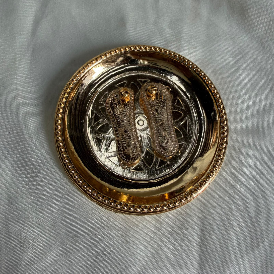 Charanpaduka with plate