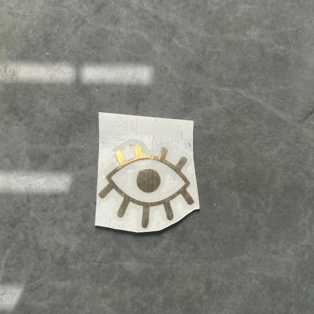 Evil eye metal sticker