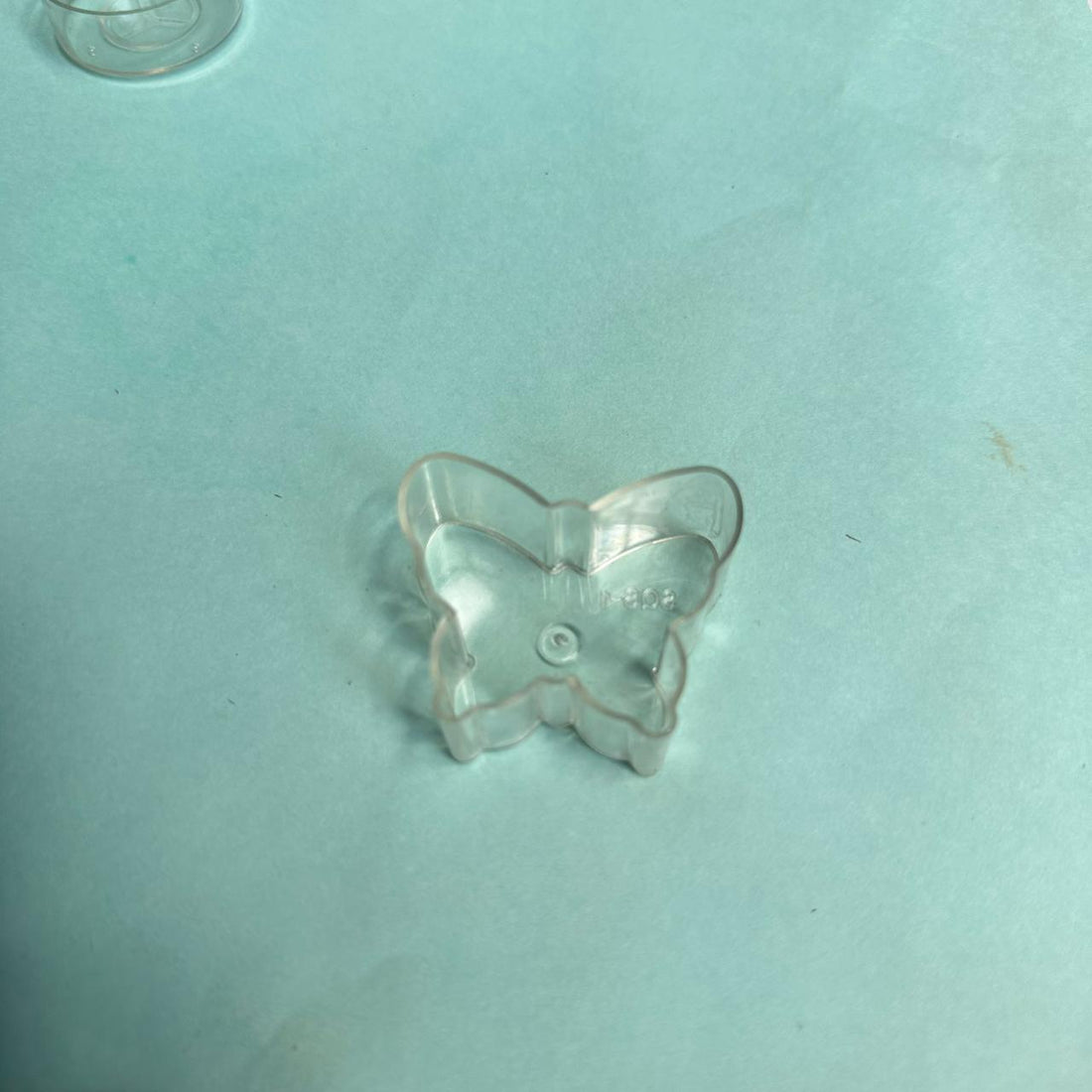 Polycup butterfly for candle