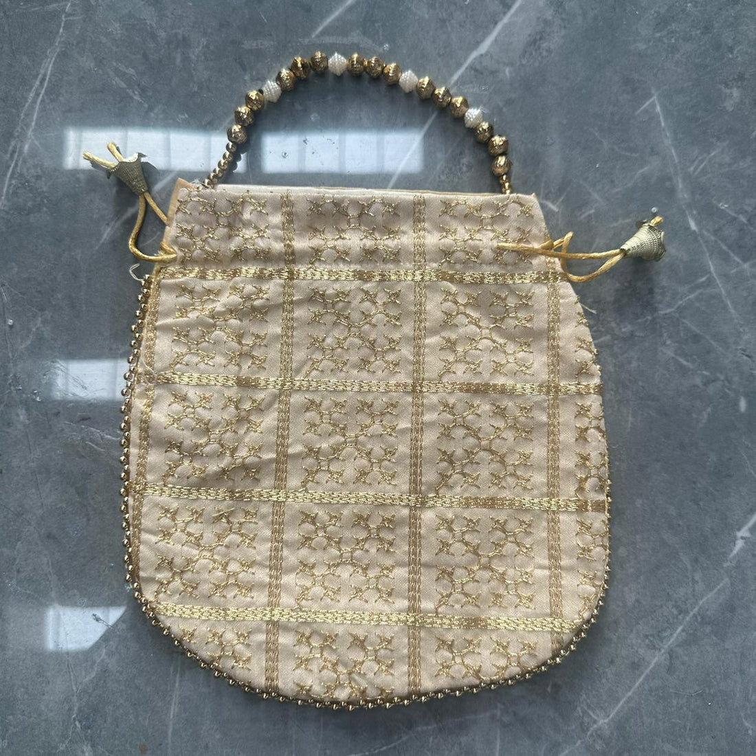 Cream Potli bag