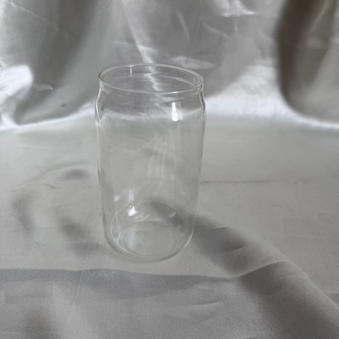 Transparent glass tumbler candle