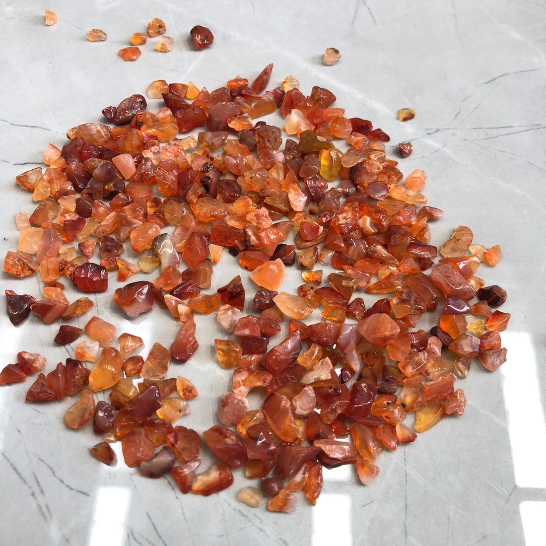 Small orange red stone 90 gms