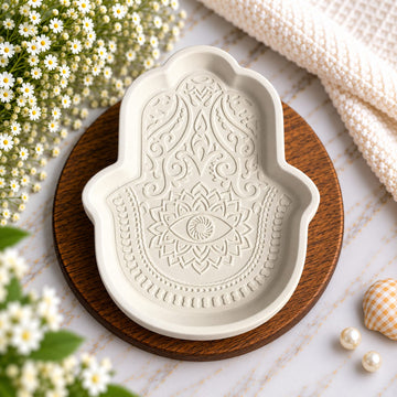 Hamsa concrete plate