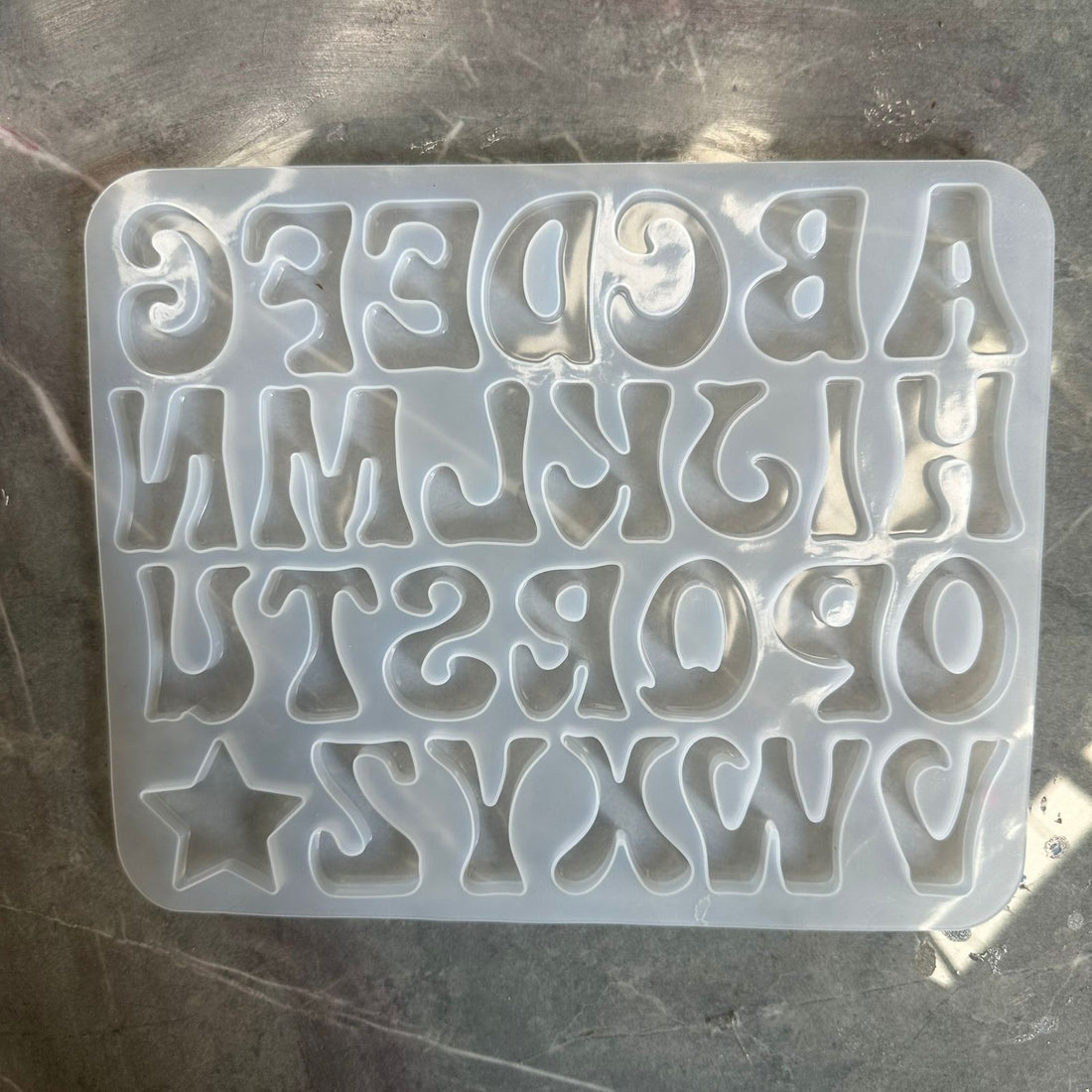 Funky style alphabet mould