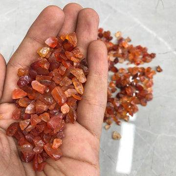 Small orange red stone 90 gms