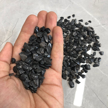 Small dark grey stone 105 gms