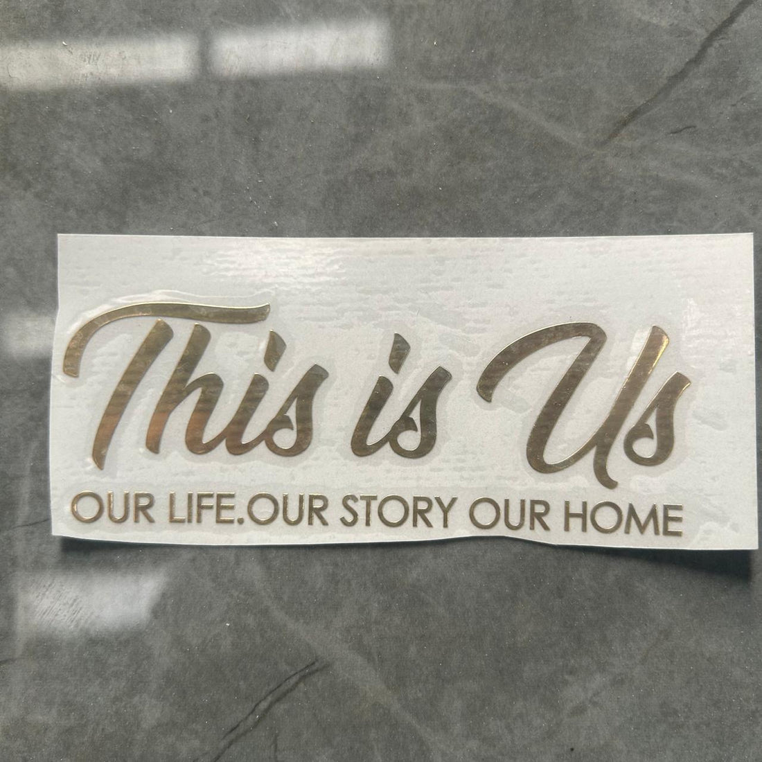 This is us metal sticker