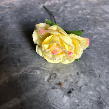 Glittery yellow flower