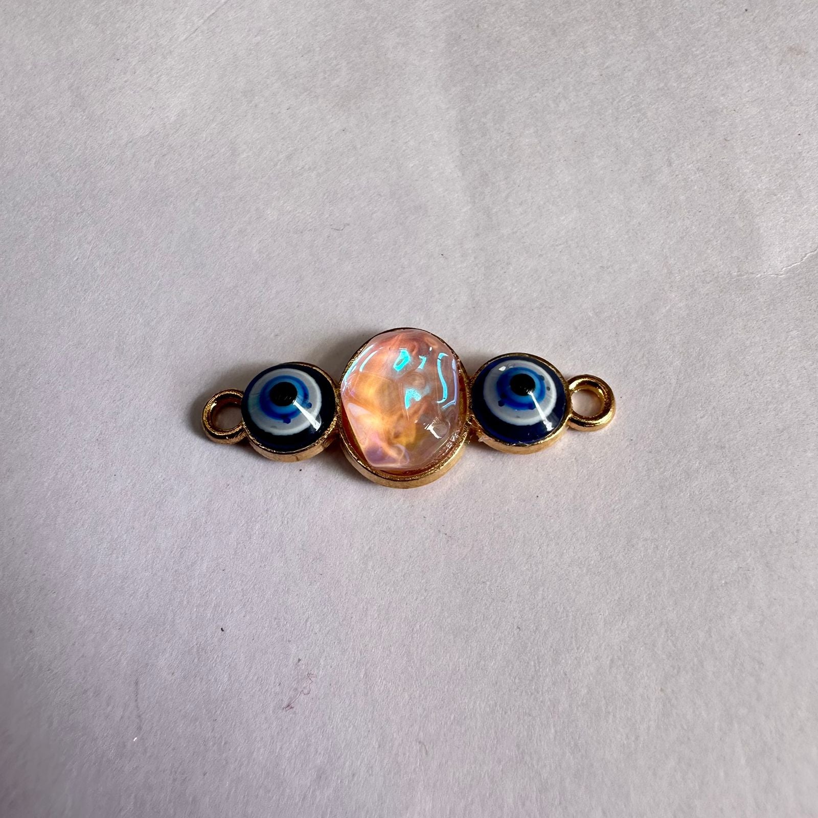 Rakhi evil eye charm orange