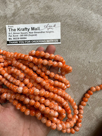 Orange marble beads