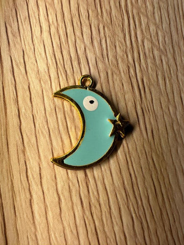 Blue half moon with evil eye charms