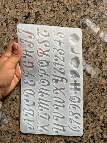 Cursive alphabet mould with hole