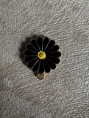 Black daisy charm